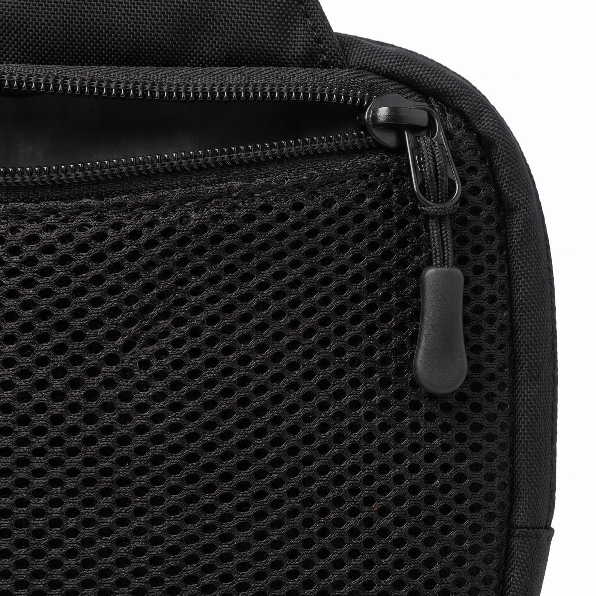 Bandolera NOMALERO V3 - bolsillo de malla exterior
